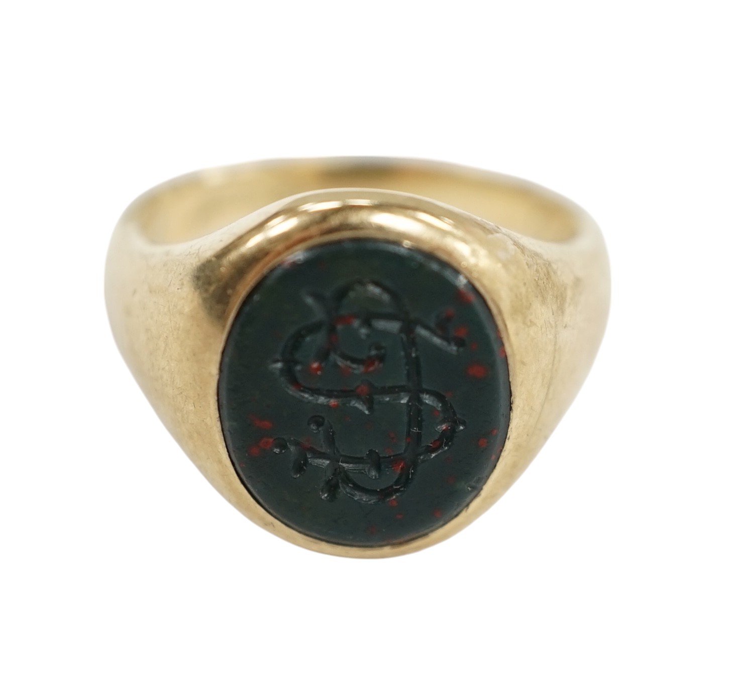 A 9ct gold and bloodstone set signet ring, with carved initial and interior inscription, size J/K, gross weight 5.9 grams. Condition - poor